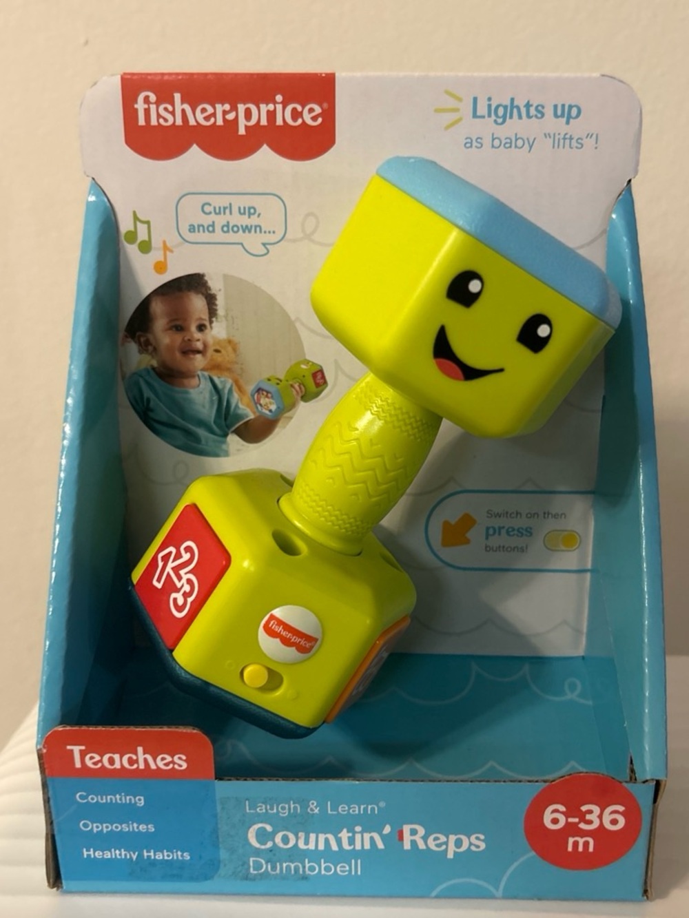 Fisher-Price Yellow and Blue Countin' Reps Light-Up Dumbbell Toy